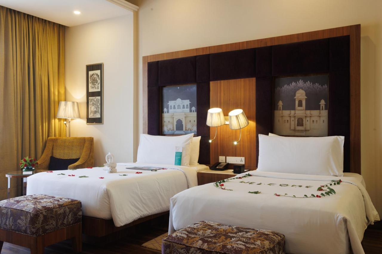 Premium Garden view with Twin Bed(20% discount on food and soft beverages, 20% discount on Spa,Buy 1 get 1 on select brands at Madeira bar between 4 pm - 10 pm)
