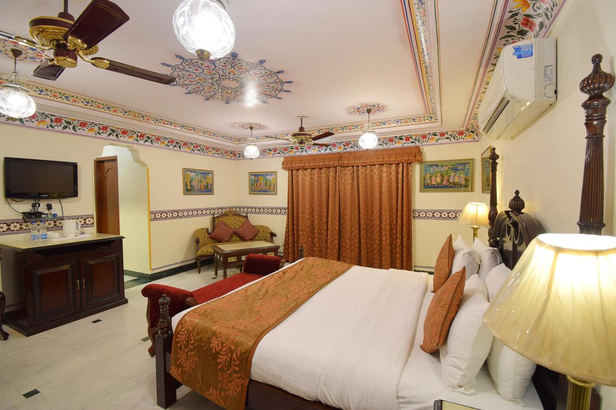 Royal Deluxe Family pickup on arrival from train or bus station Enjoy a daily Rajasthani dance & music show from 7–9 PM swimming pool a dedicated travel desk to assist local sightseeing tours intercity travel arrangements & activit