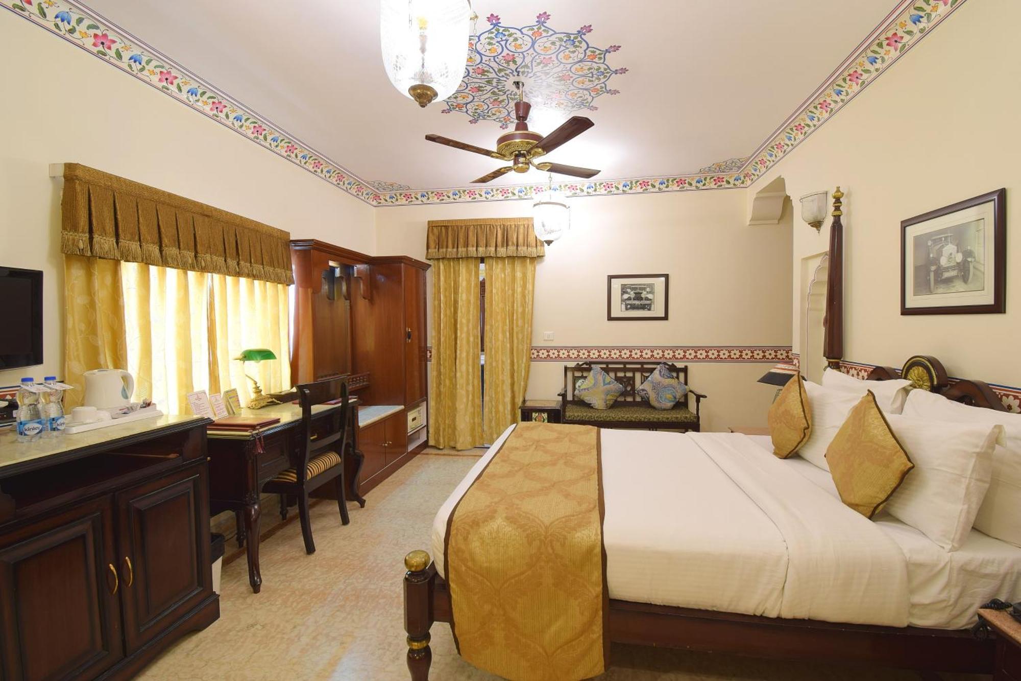 Royal Deluxe Family pickup on arrival from train or bus station Enjoy a daily Rajasthani dance & music show from 7–9 PM swimming pool a dedicated travel desk to assist local sightseeing tours intercity travel arrangements & activit