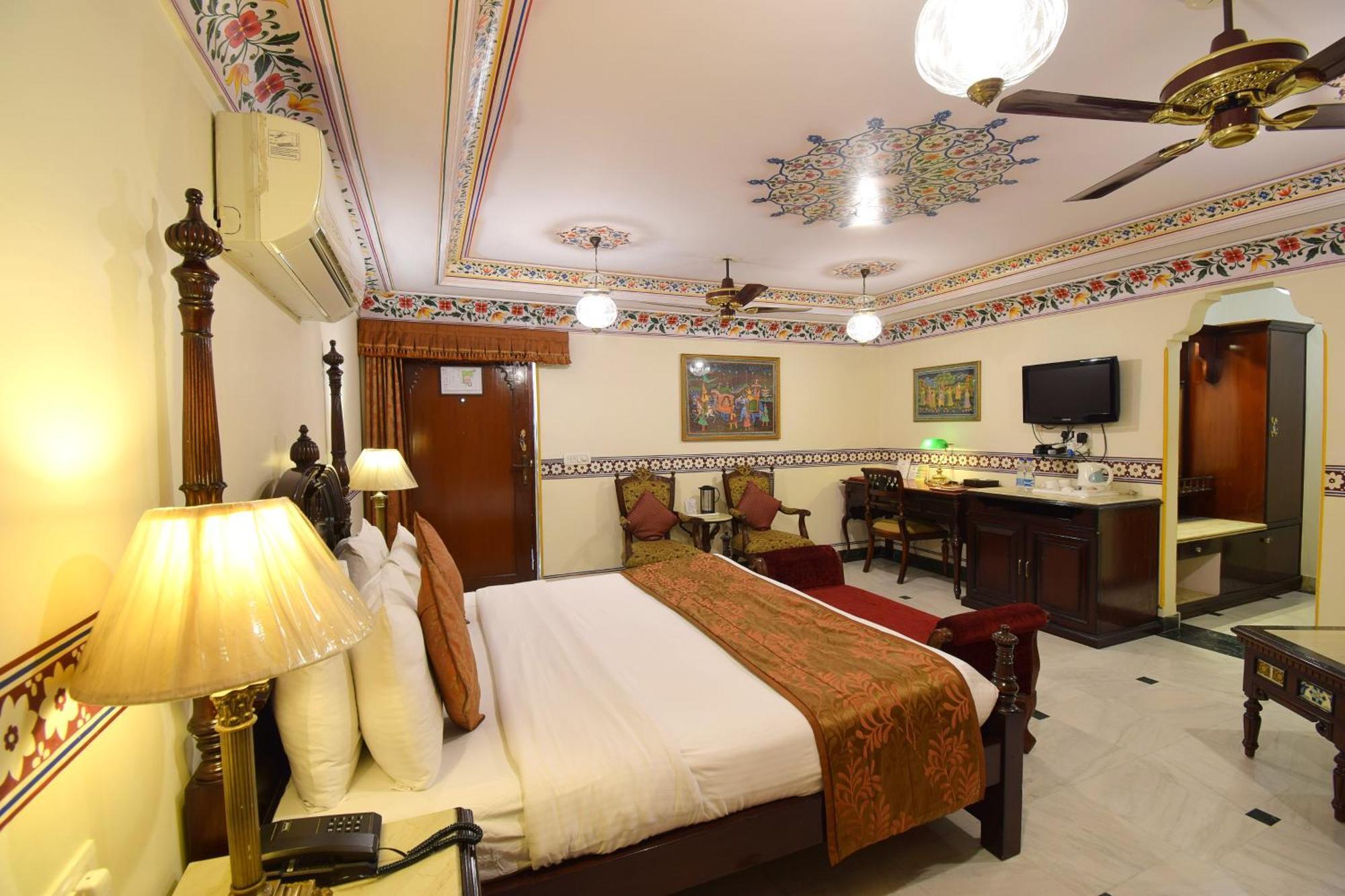 Royal Deluxe Family pickup on arrival from train or bus station Enjoy a daily Rajasthani dance & music show from 7–9 PM swimming pool a dedicated travel desk to assist local sightseeing tours intercity travel arrangements & activit