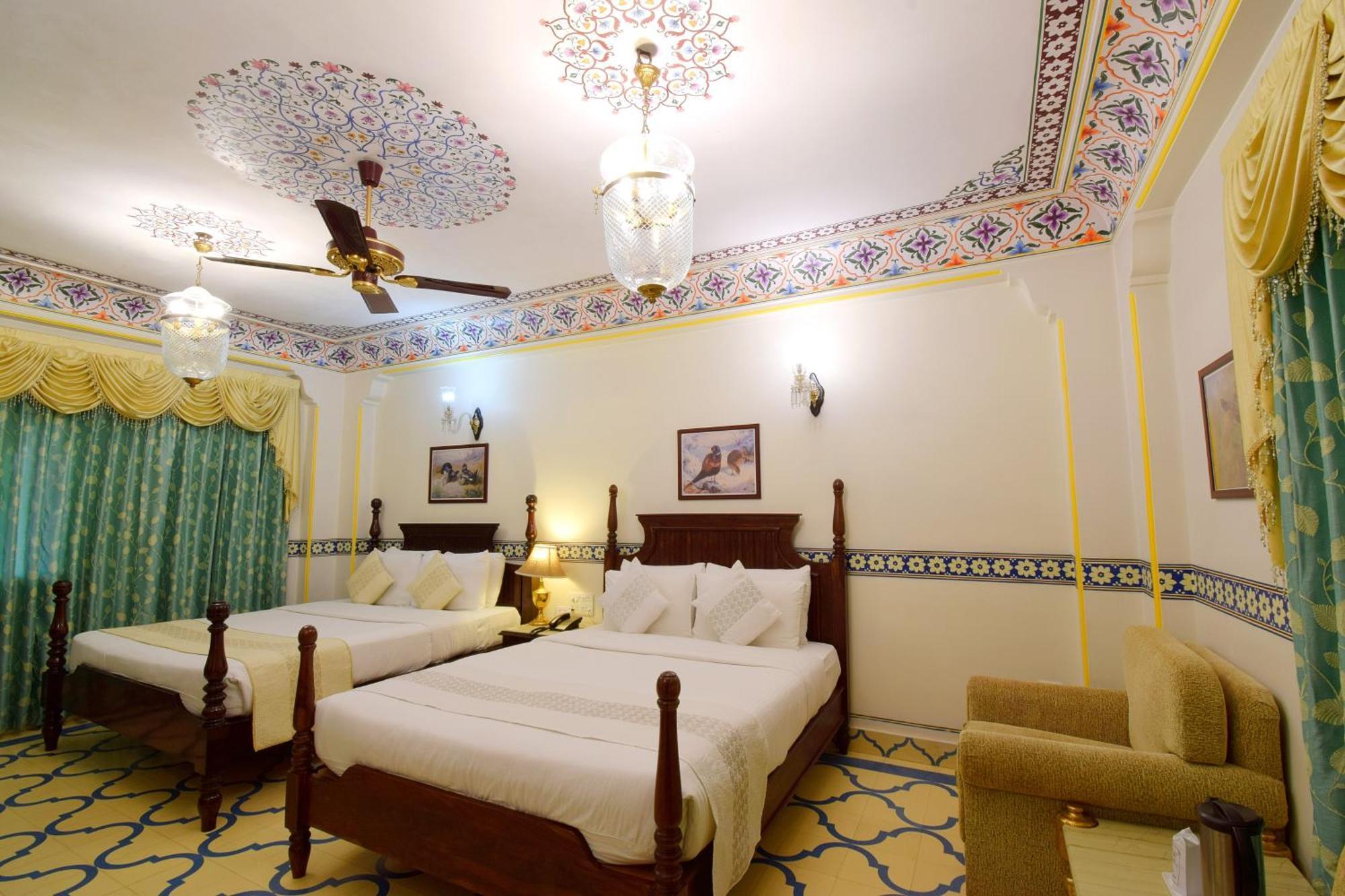 Royal Deluxe Family pickup on arrival from train or bus station Enjoy a daily Rajasthani dance & music show from 7–9 PM swimming pool a dedicated travel desk to assist local sightseeing tours intercity travel arrangements & activit