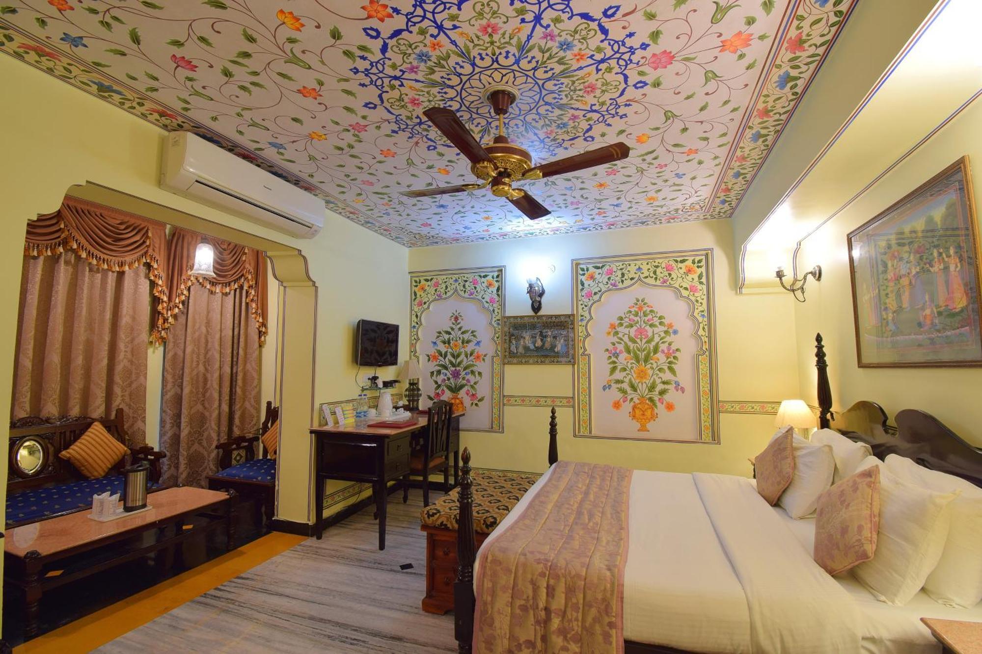 Royal Deluxe Family pickup on arrival from train or bus station Enjoy a daily Rajasthani dance & music show from 7–9 PM swimming pool a dedicated travel desk to assist local sightseeing tours intercity travel arrangements & activit