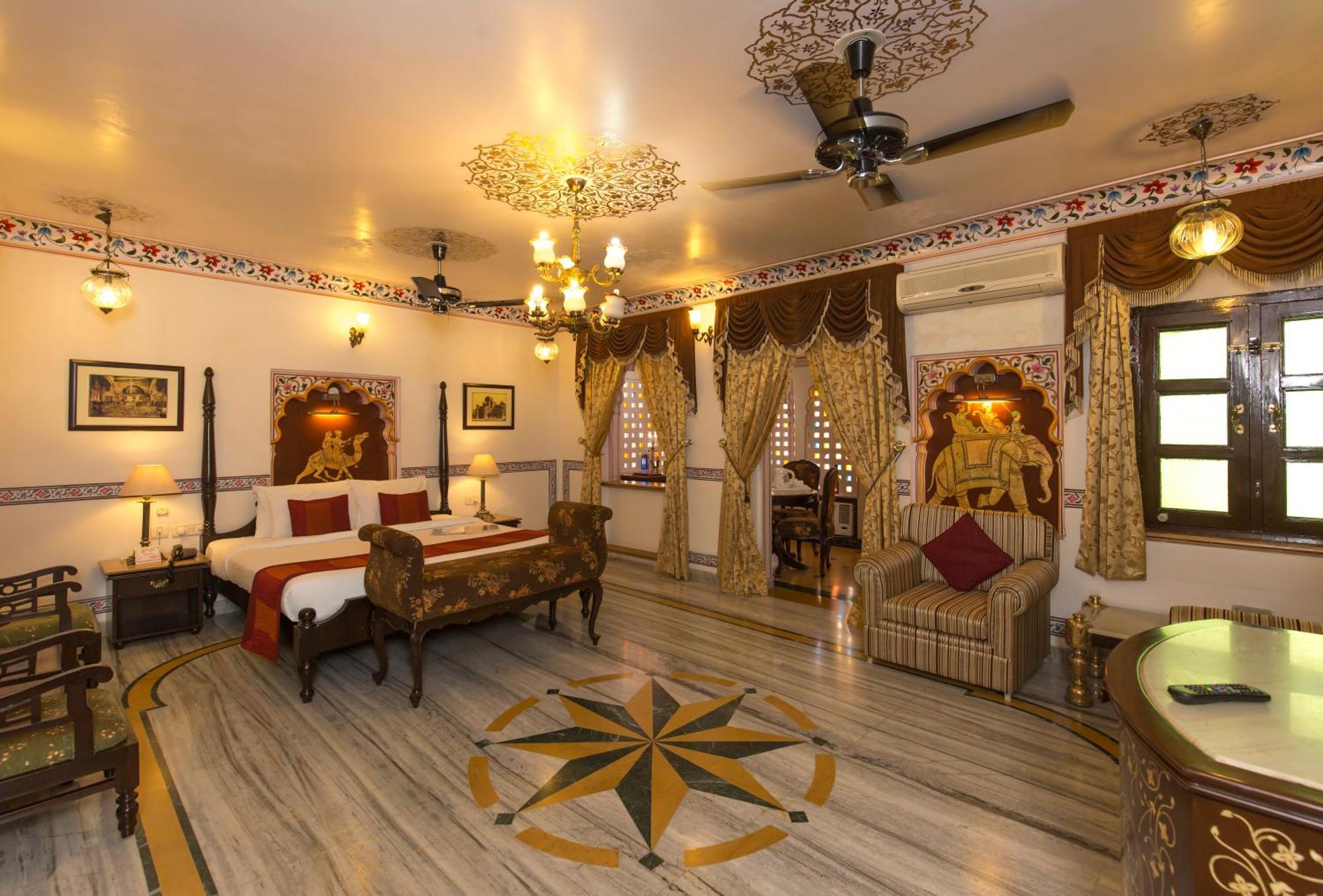 Royal Suite pickup on arrival from train or bus station Enjoy a daily Rajasthani dance & music show from 7–9 PM swimming pool a dedicated travel desk to assist local sightseeing tours intercity travel arrangements & activities