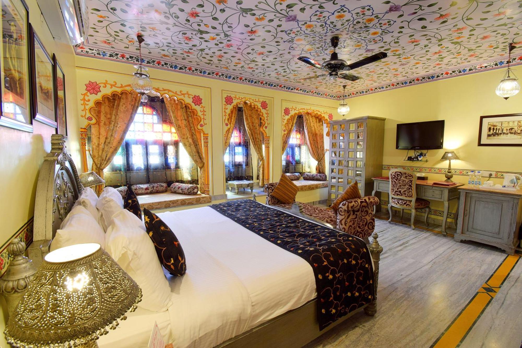 Royal Suite pickup on arrival from train or bus station Enjoy a daily Rajasthani dance & music show from 7–9 PM swimming pool a dedicated travel desk to assist local sightseeing tours intercity travel arrangements & activities