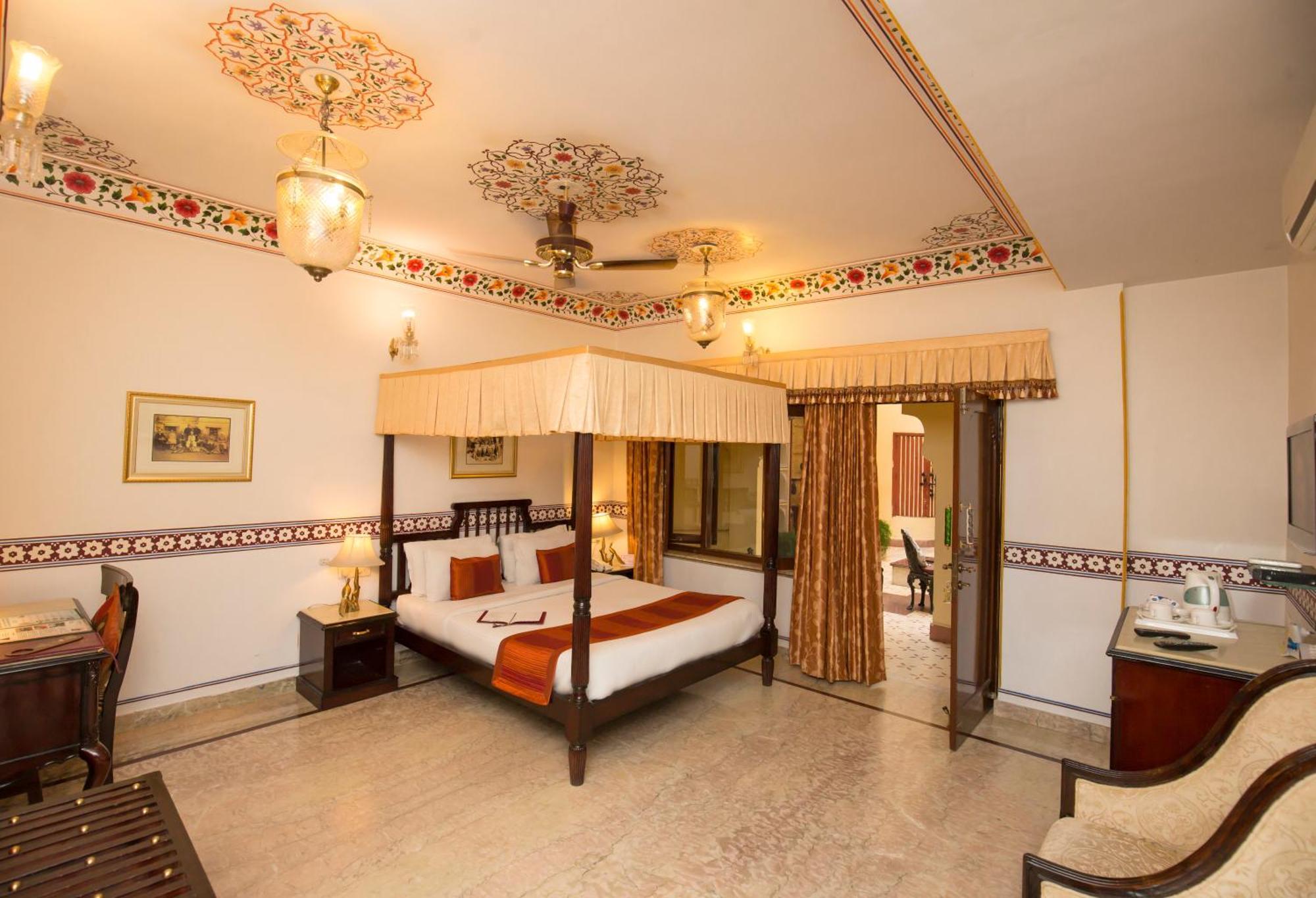 Royal Suite Family pickup on arrival from train or bus station Enjoy a daily Rajasthani dance & music show from 7–9 PM swimming pool a dedicated travel desk to assist local sightseeing tours intercity travel arrangements & activiti