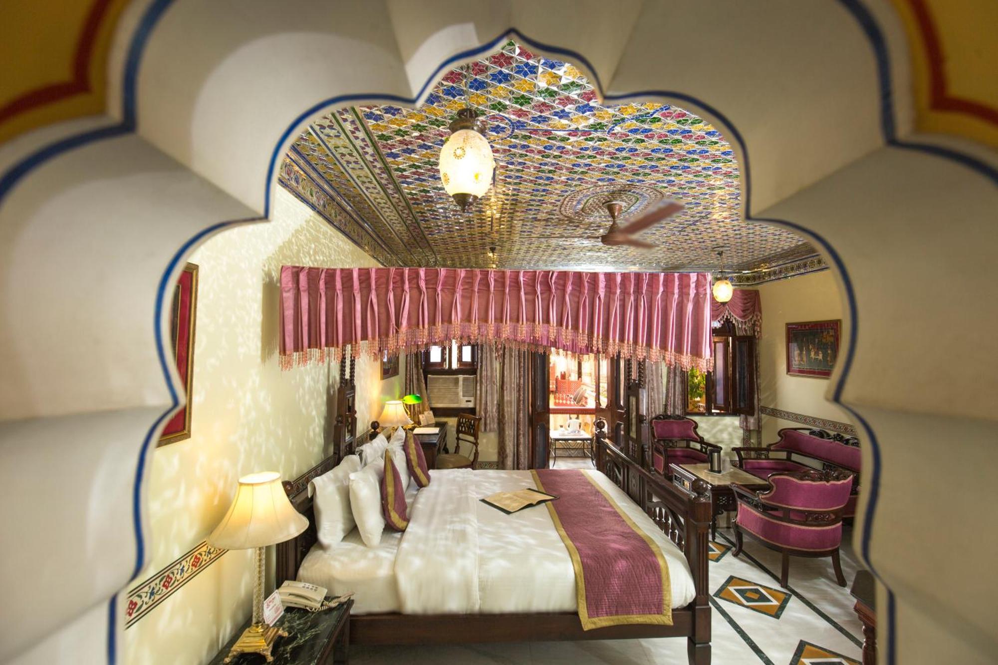 Royal Suite Family pickup on arrival from train or bus station Enjoy a daily Rajasthani dance & music show from 7–9 PM swimming pool a dedicated travel desk to assist local sightseeing tours intercity travel arrangements & activiti