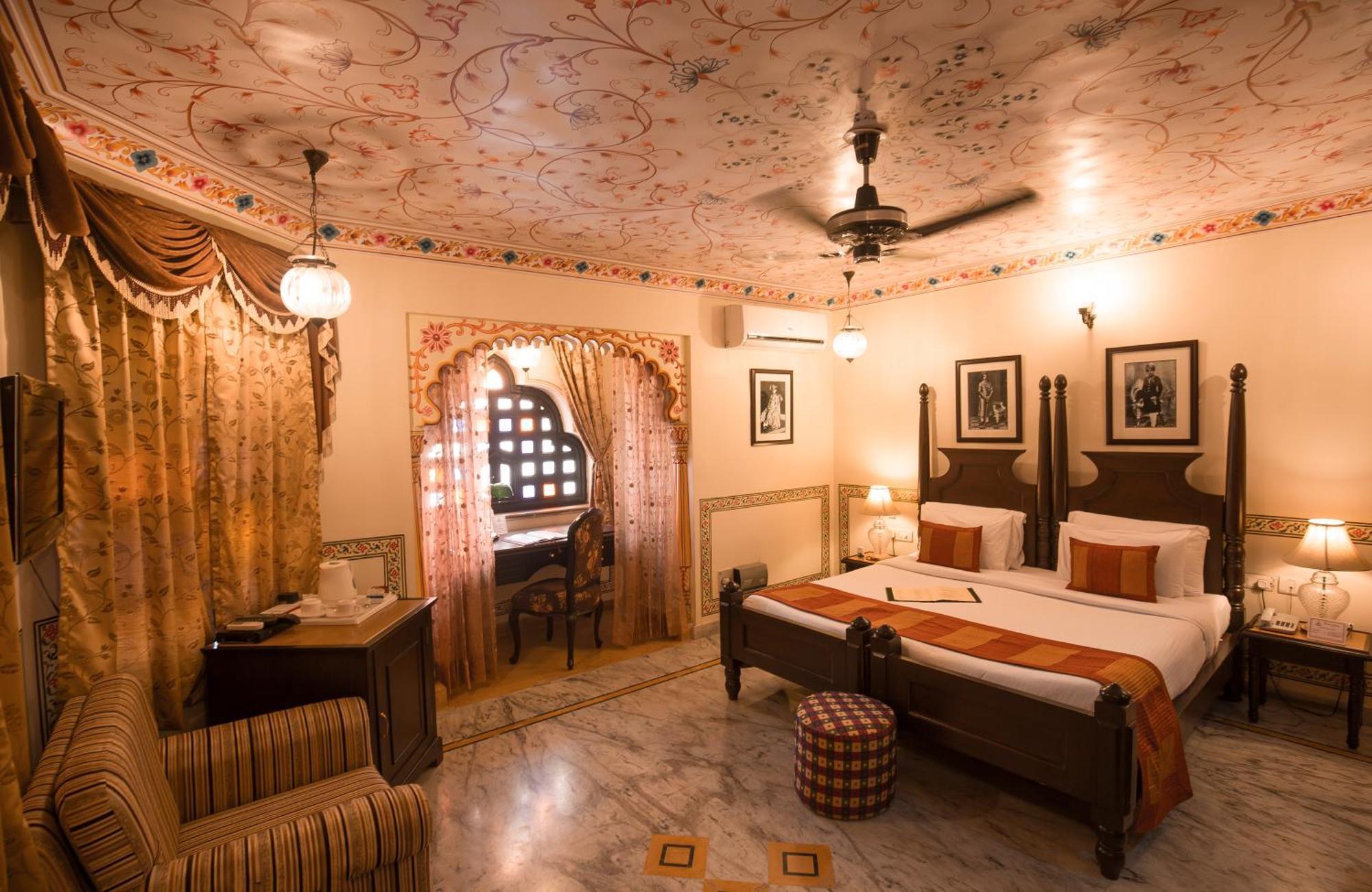 Royal Suite Family pickup on arrival from train or bus station Enjoy a daily Rajasthani dance & music show from 7–9 PM swimming pool a dedicated travel desk to assist local sightseeing tours intercity travel arrangements & activiti