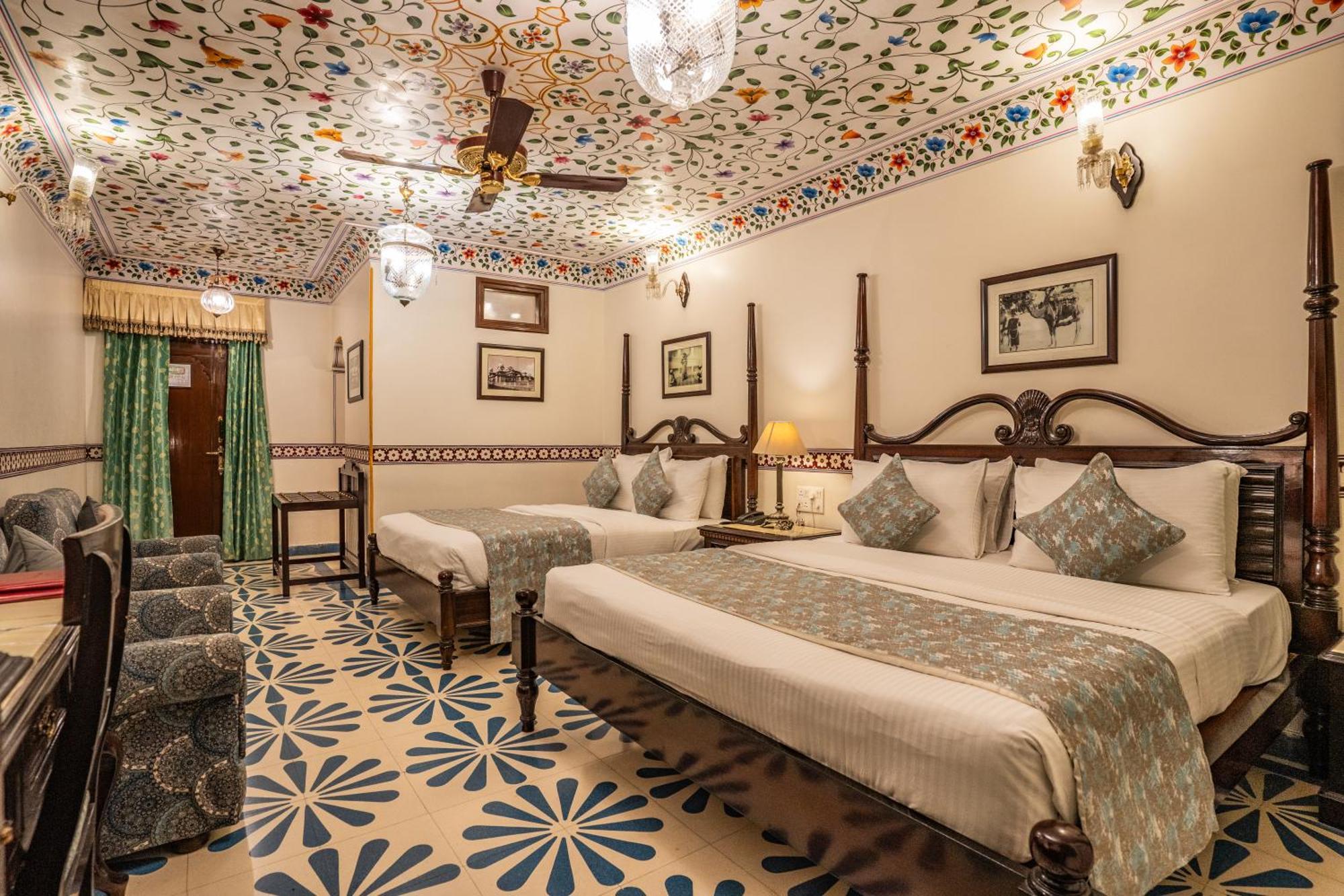 Royal Suite Family pickup on arrival from train or bus station Enjoy a daily Rajasthani dance & music show from 7–9 PM swimming pool a dedicated travel desk to assist local sightseeing tours intercity travel arrangements & activiti