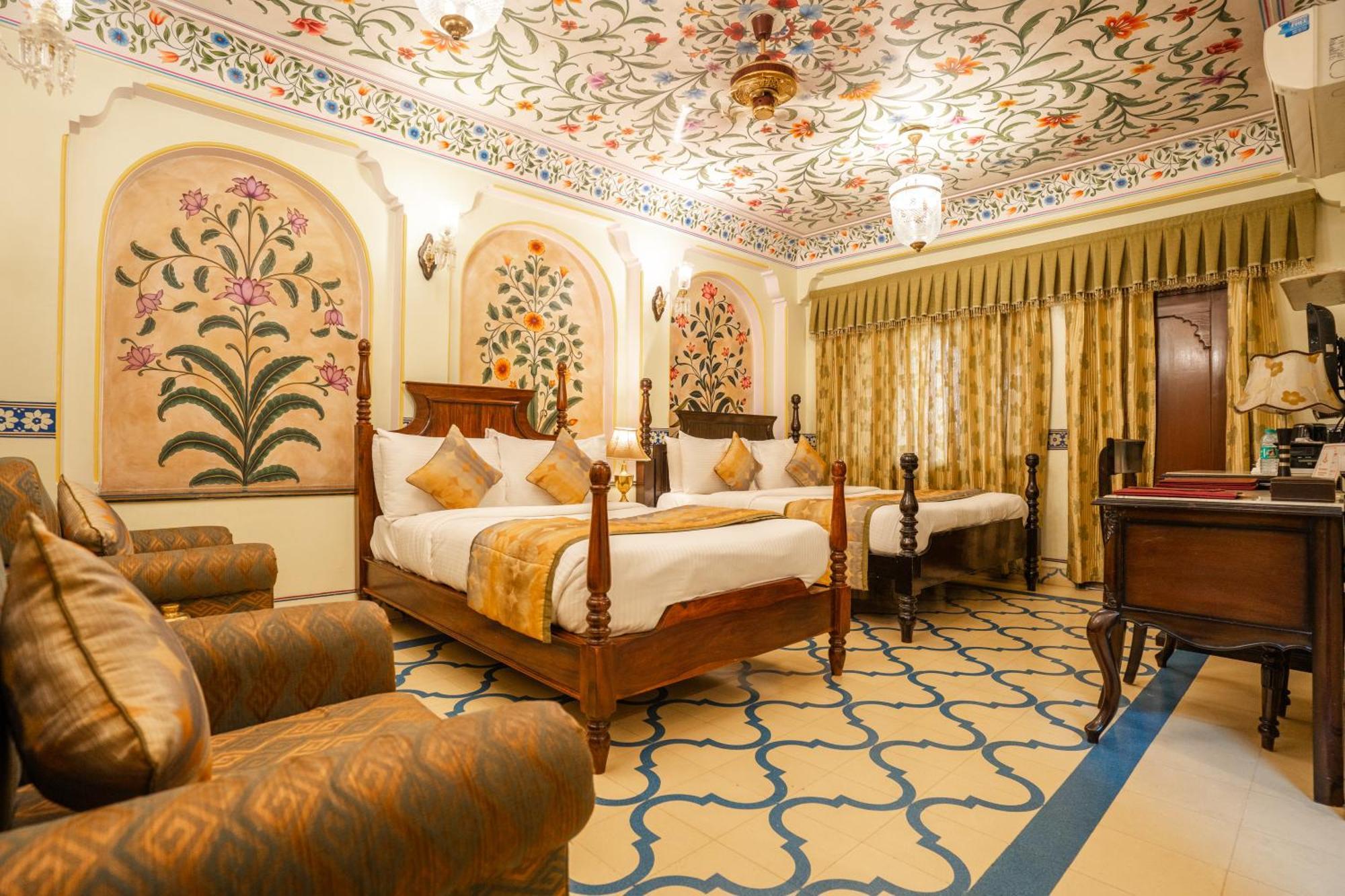 Royal Deluxe Family pickup on arrival from train or bus station Enjoy a daily Rajasthani dance & music show from 7–9 PM swimming pool a dedicated travel desk to assist local sightseeing tours intercity travel arrangements & activit