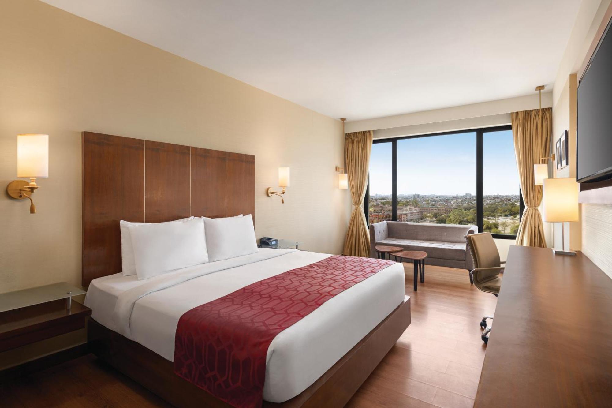 Premium King Room City ViewEnjoy Happy Hours 11 on Alcoholic Beverages | on Food & Beverage services | Guaranteed Early check & Late check-out by 3hrs