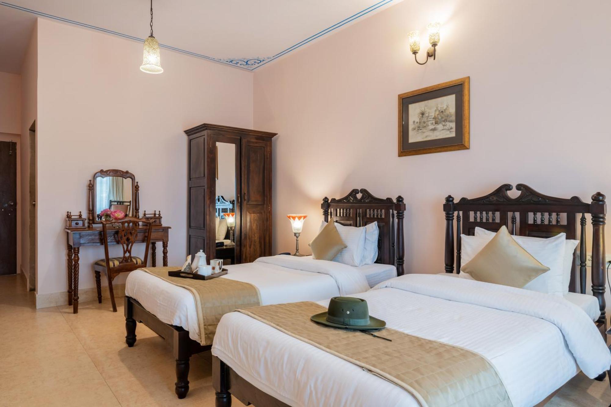 Junior Suite – Includes free pickup from airport/ train station / bus station via tuk-tuk, & a dedicated travel desk to assist with local sightseeing tours, intercity travel arrangements & activities.