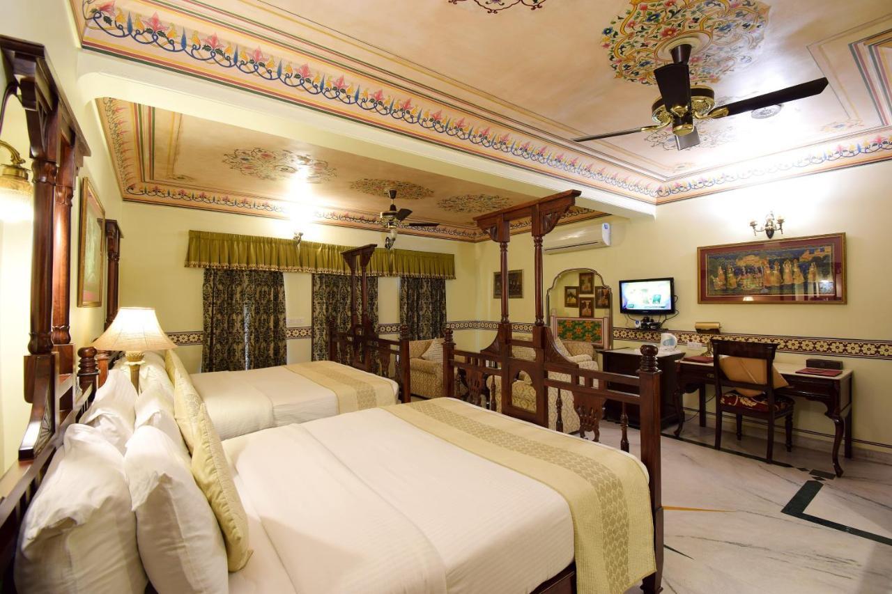 Royal Suite Family pickup on arrival from train or bus station Enjoy a daily Rajasthani dance & music show from 7–9 PM swimming pool a dedicated travel desk to assist local sightseeing tours intercity travel arrangements & activiti