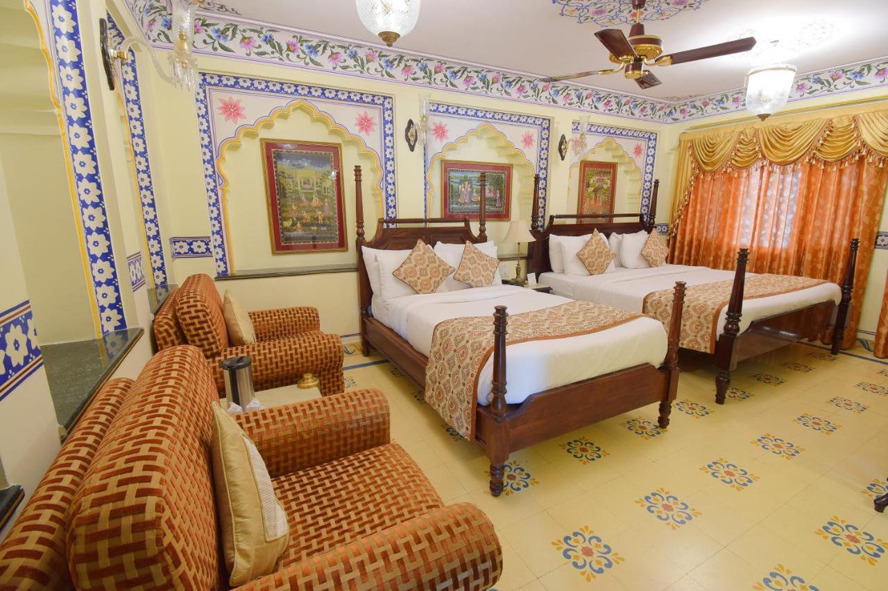 Royal Suite Family pickup on arrival from train or bus station Enjoy a daily Rajasthani dance & music show from 7–9 PM swimming pool a dedicated travel desk to assist local sightseeing tours intercity travel arrangements & activiti