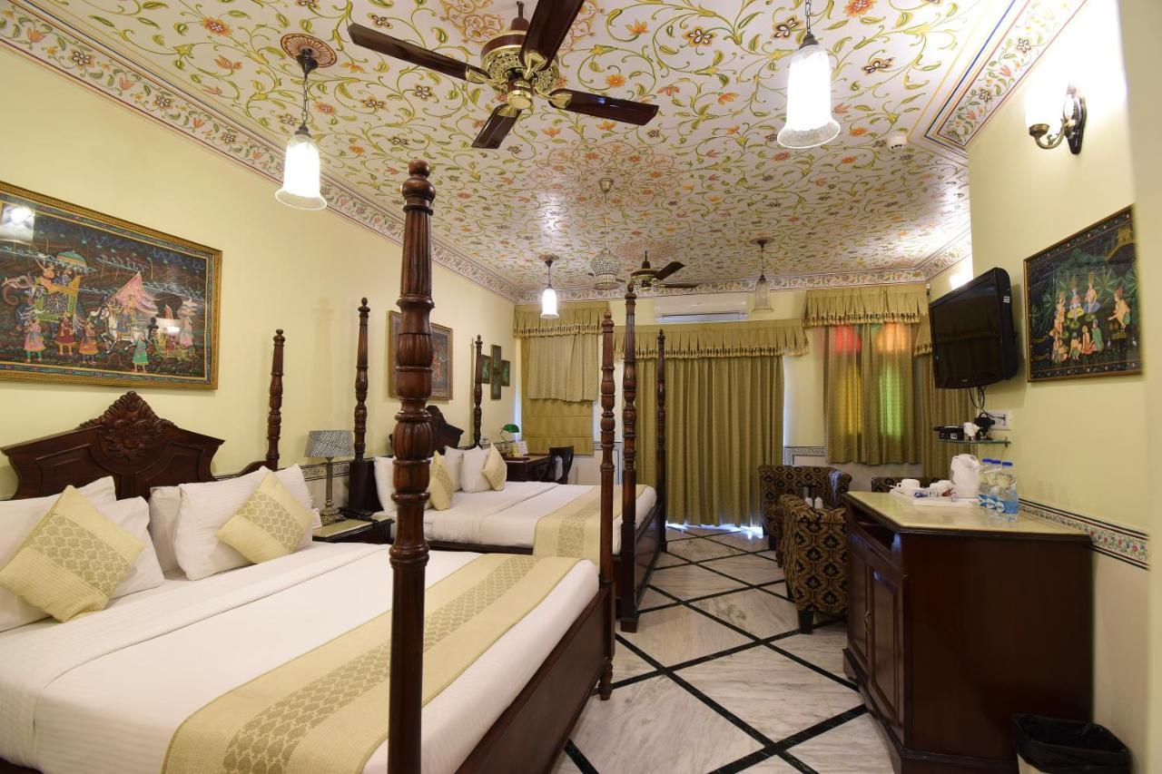 Royal Suite Family pickup on arrival from train or bus station Enjoy a daily Rajasthani dance & music show from 7–9 PM swimming pool a dedicated travel desk to assist local sightseeing tours intercity travel arrangements & activiti