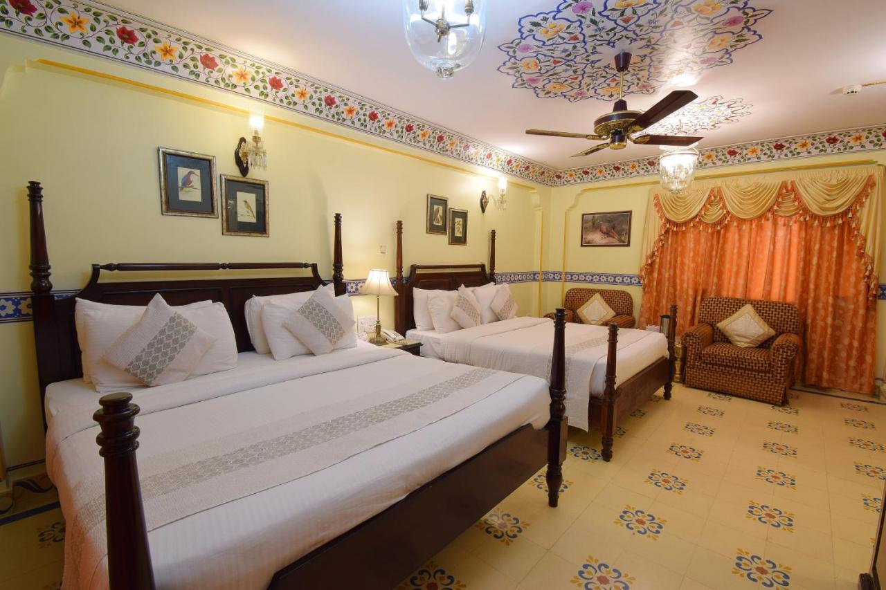 Royal Suite Family pickup on arrival from train or bus station Enjoy a daily Rajasthani dance & music show from 7–9 PM swimming pool a dedicated travel desk to assist local sightseeing tours intercity travel arrangements & activiti