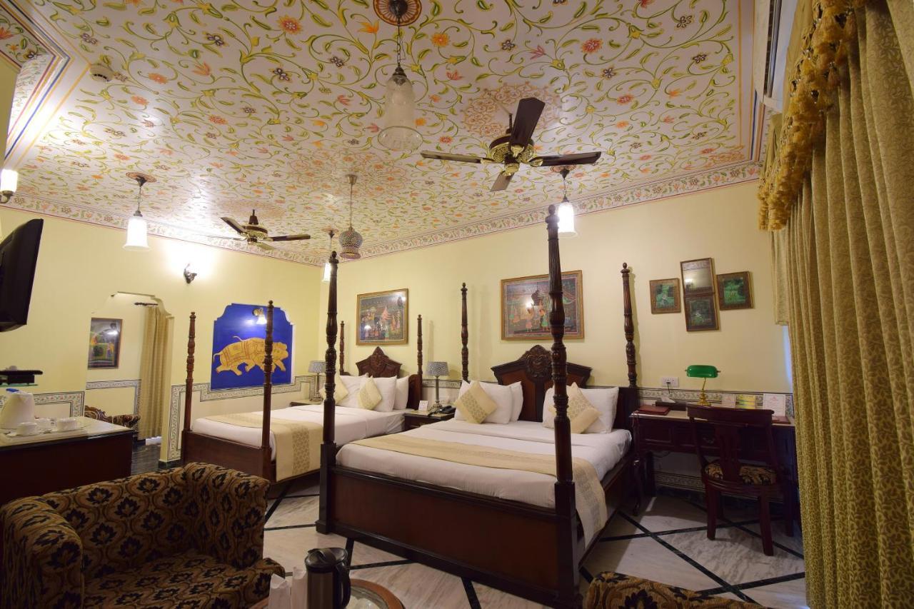 Royal Suite Family pickup on arrival from train or bus station Enjoy a daily Rajasthani dance & music show from 7–9 PM swimming pool a dedicated travel desk to assist local sightseeing tours intercity travel arrangements & activiti