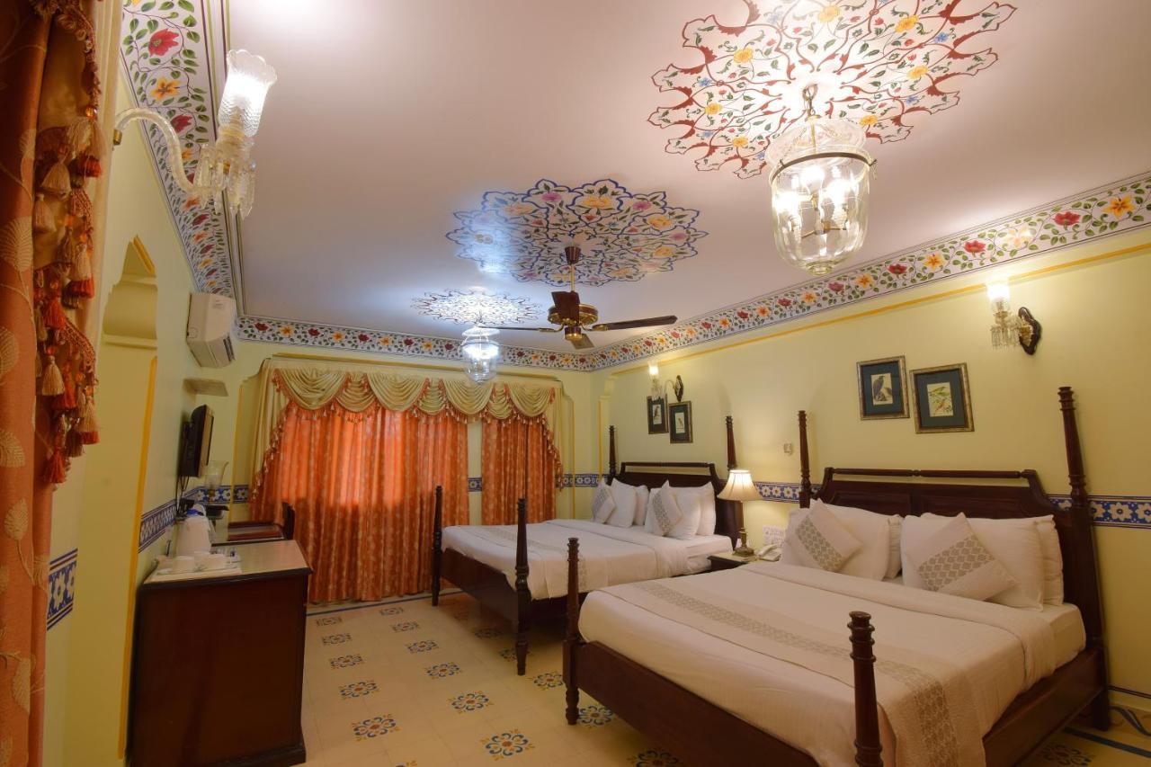 Royal Suite Family pickup on arrival from train or bus station Enjoy a daily Rajasthani dance & music show from 7–9 PM swimming pool a dedicated travel desk to assist local sightseeing tours intercity travel arrangements & activiti