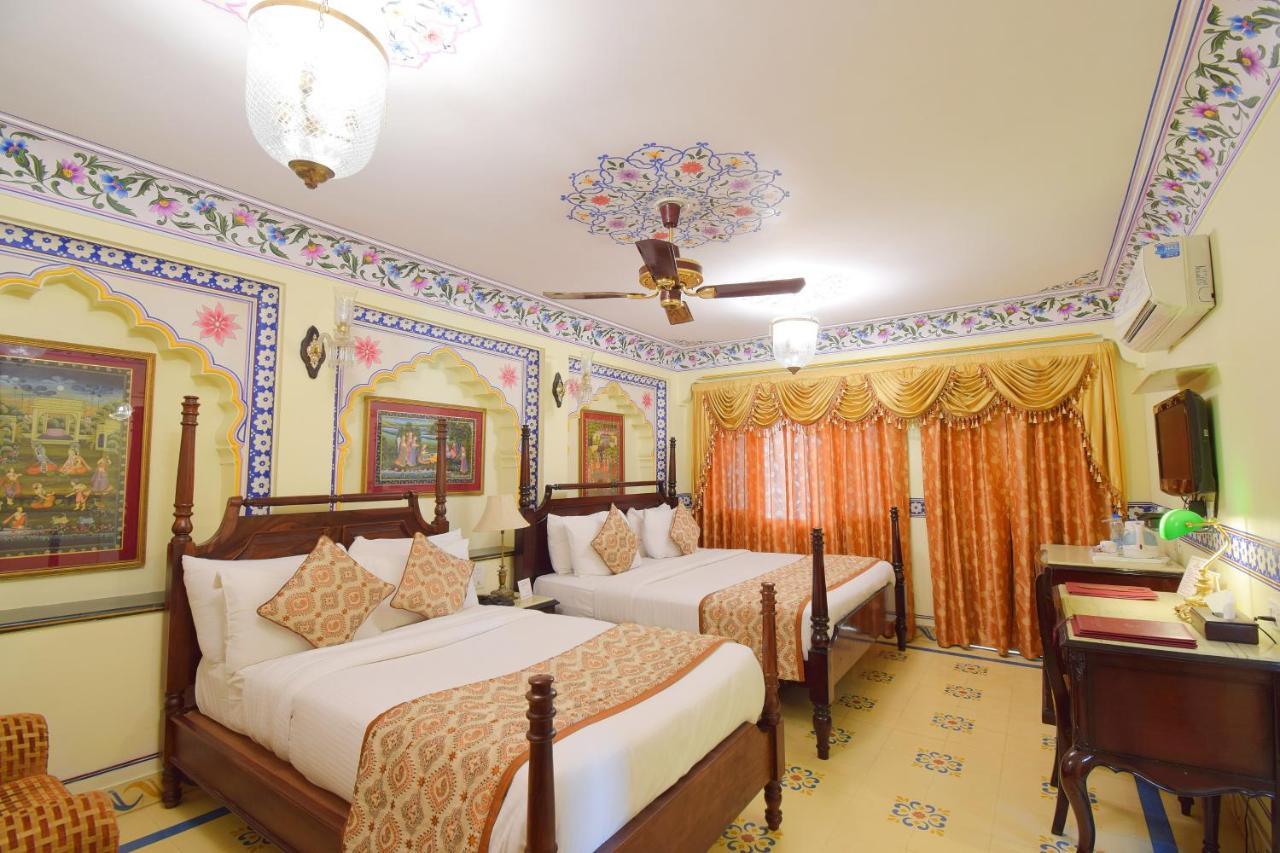 Royal Suite Family pickup on arrival from train or bus station Enjoy a daily Rajasthani dance & music show from 7–9 PM swimming pool a dedicated travel desk to assist local sightseeing tours intercity travel arrangements & activiti